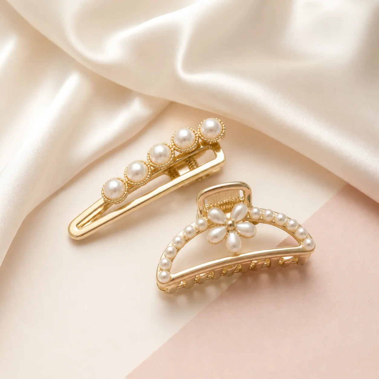 Pearl hair clips on ivory fabric